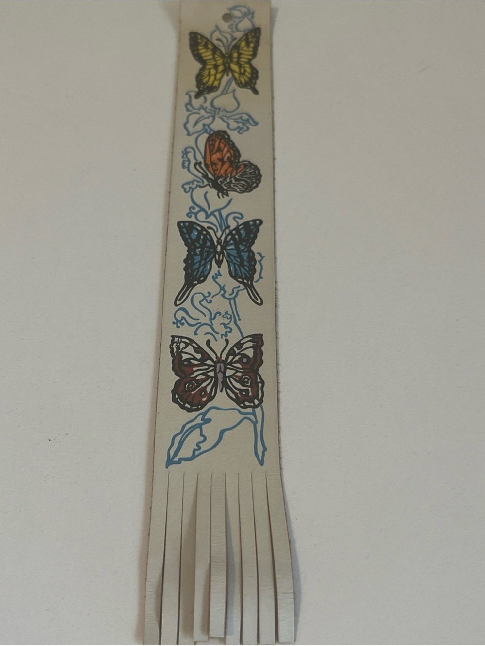 Cream Leather Fringe Bookmark with Colorful Butterfly Motif